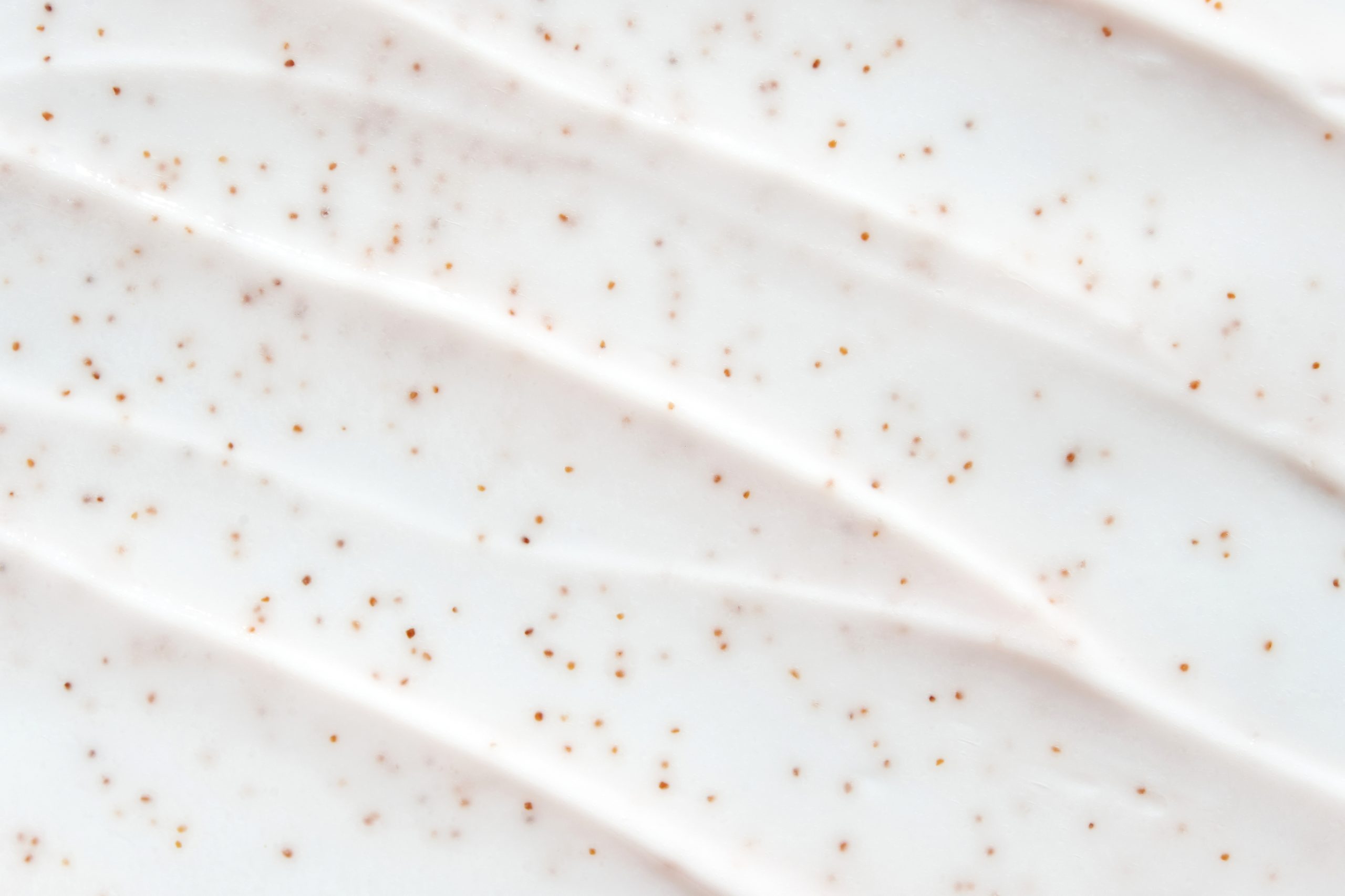 Sugr Buff whipped foaming sugar scrub in a jar with fluffy texture for exfoliating and cleaning skin.