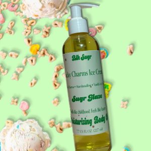 A bottle of Blk Sugr “Lucky Charms Ice Cream” Sugr Glaze body oil on a light green background, surrounded by colorful cereal pieces and scoops of marshmallow ice cream. The label includes notes of Lucky Charms, marshmallow, and vanilla ice cream.