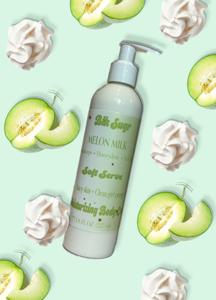 A bottle of Blk Sugr Melon Milk Soft Serve Lotion on a mint background, surrounded by juicy cantaloupe slices, honeydew, and whipped cream.