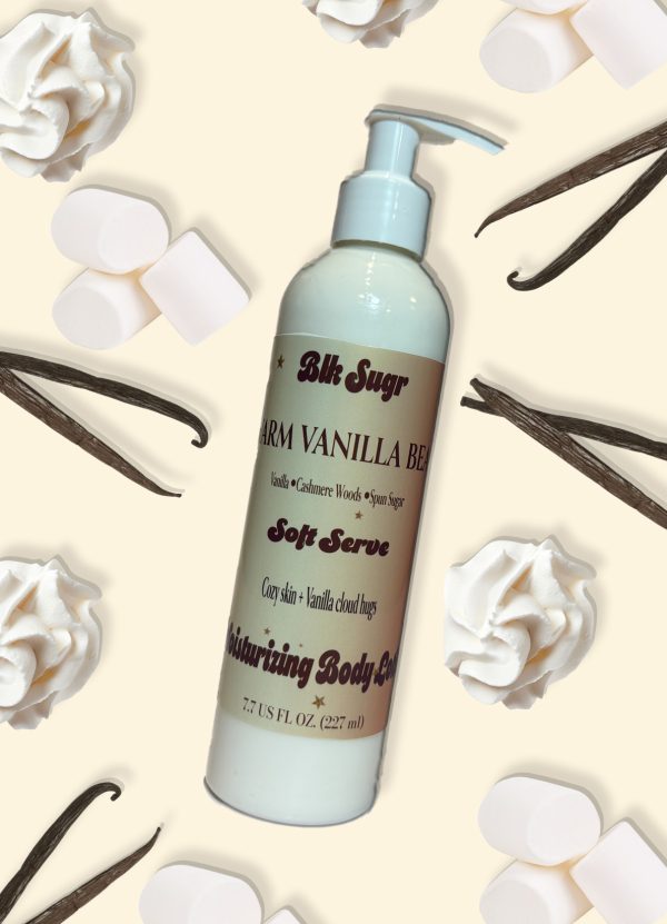 A bottle of Blk Sugr Warm Vanilla Bean Soft Serve Lotion on a cream background with whipped cream, marshmallows, and vanilla pods.